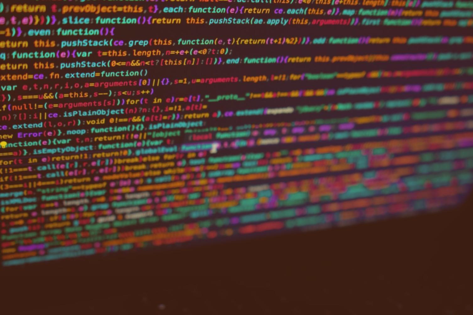 Professional programming workspace showing automated systems development